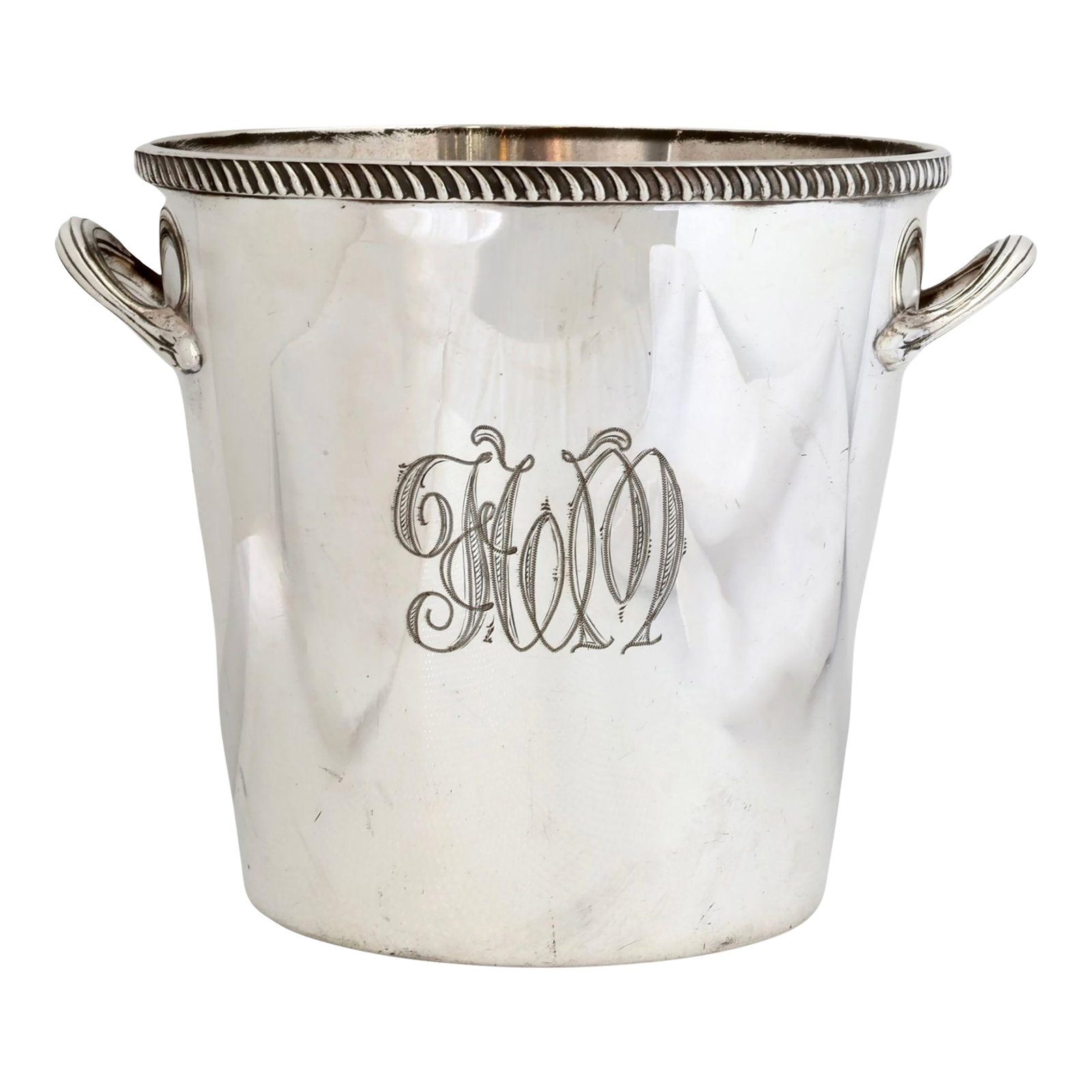 Antique Elkington Silverplate Champagne Bucket: 19th century English silverplate champagne bucket by Elkington, one of England's premier foundries. This classic form features a rope-twist rim, substantial side handles, and an elegant engraved monog