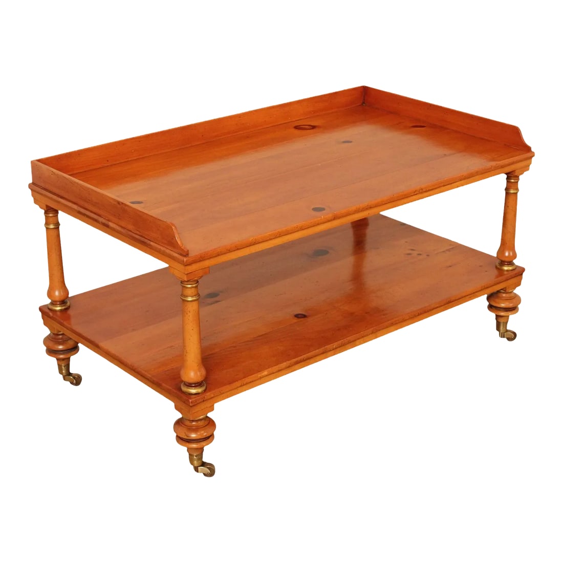 1990s Baker Historic Charleston Reproductions Pine Coffee Table: High Quality American Made Distressed Solid Pine Wood Two-Tier English Regency Style Cocktail Table on Solid Brass Rolling Casters Condition: Alterations: Original Condition Unaltered Imperfections: