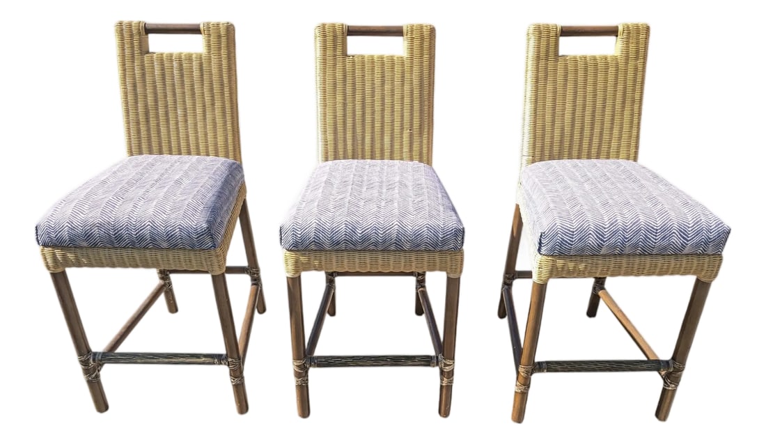 Three McGuire Furniture Thomas Pheasant Counter Stools: McGuire Furniture Thomas Pheasant counter stools featuring woven rattan and a dark bamboo base. Some wear on the rattan. Condition: Alterations: Original Condition Unaltered Imperfections: Some