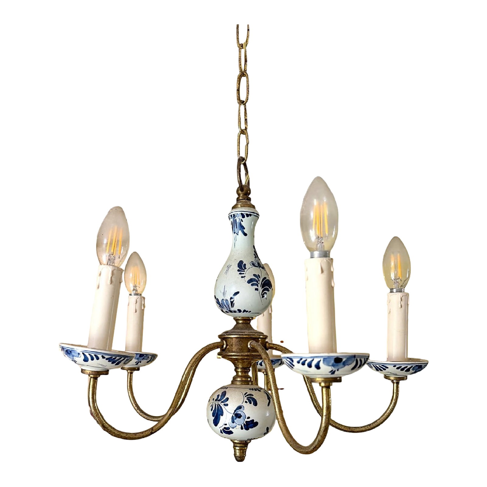 Vintage Dutch Delft Blue & White Porcelain Patinated Brass 5-Arm Chandelier: An elegant mid-century Dutch Flemish-style 5-arm chandelier, beautifully crafted from solid brass and authentic hand-painted blue and white porcelain. This classic fixture effortlessly anchors a room,