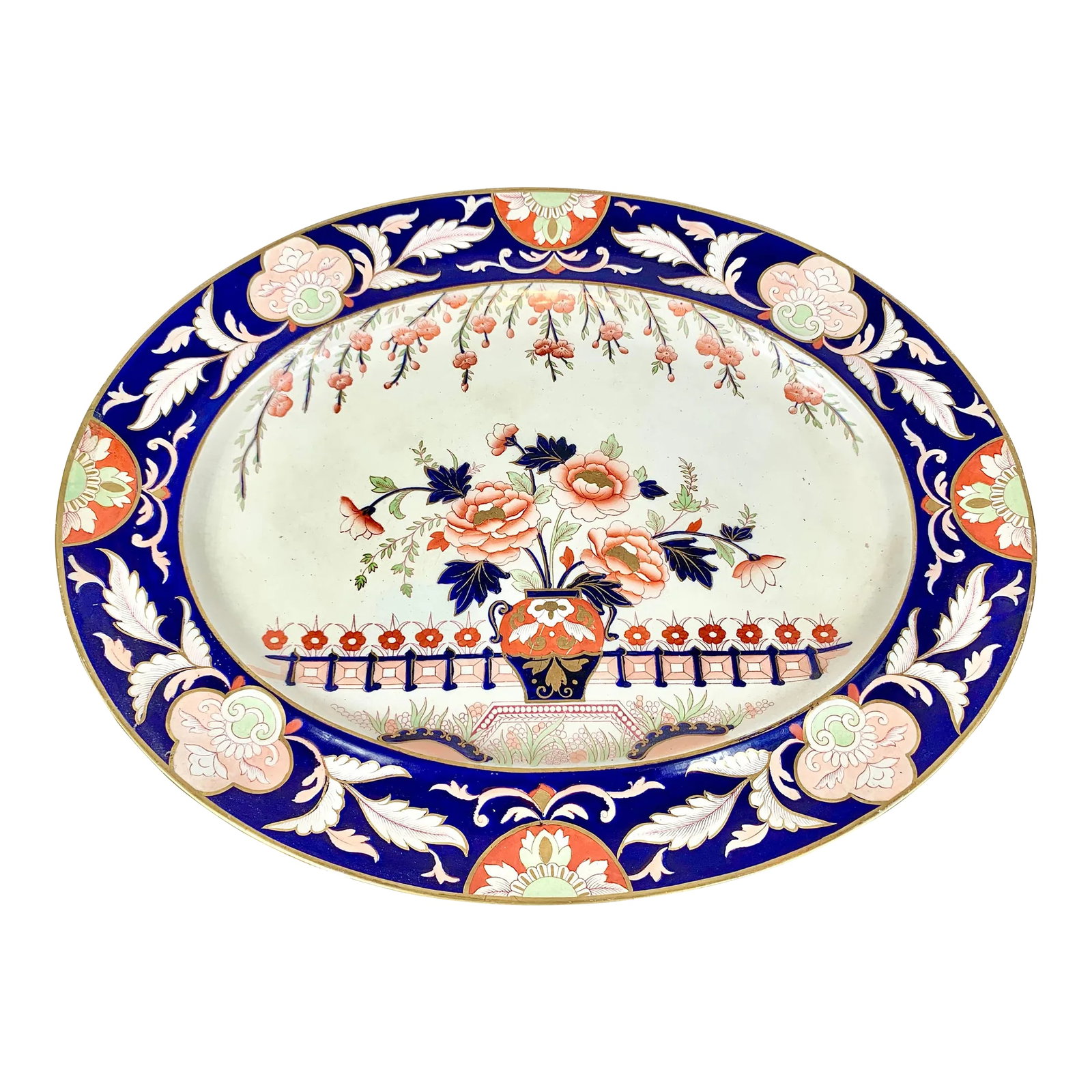 Antique Imari-Style Ironstone Serving Platter: Huge antique ironstone platter. Striking colors and beautiful detailing. Small repair on edge that does not go through. Unmarked. Fabulous piece that makes a statement in any space. This is a