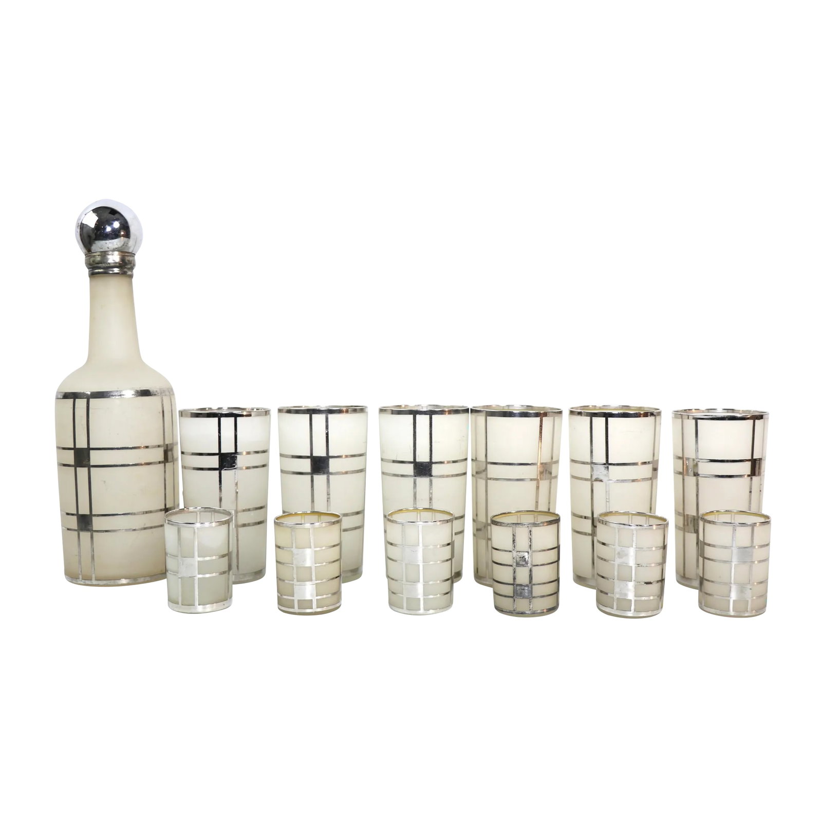 1930s Fostoria Silver Overlay Art Deco Bar Cocktail Set- 13 Pieces: Spectacular silver overlay cocktail set, having a frosted white glass ground with Machine Age geometric silver overlay trim. The set consists of 6 large cocktail glasses, 6 shot glasses, and a bottle 