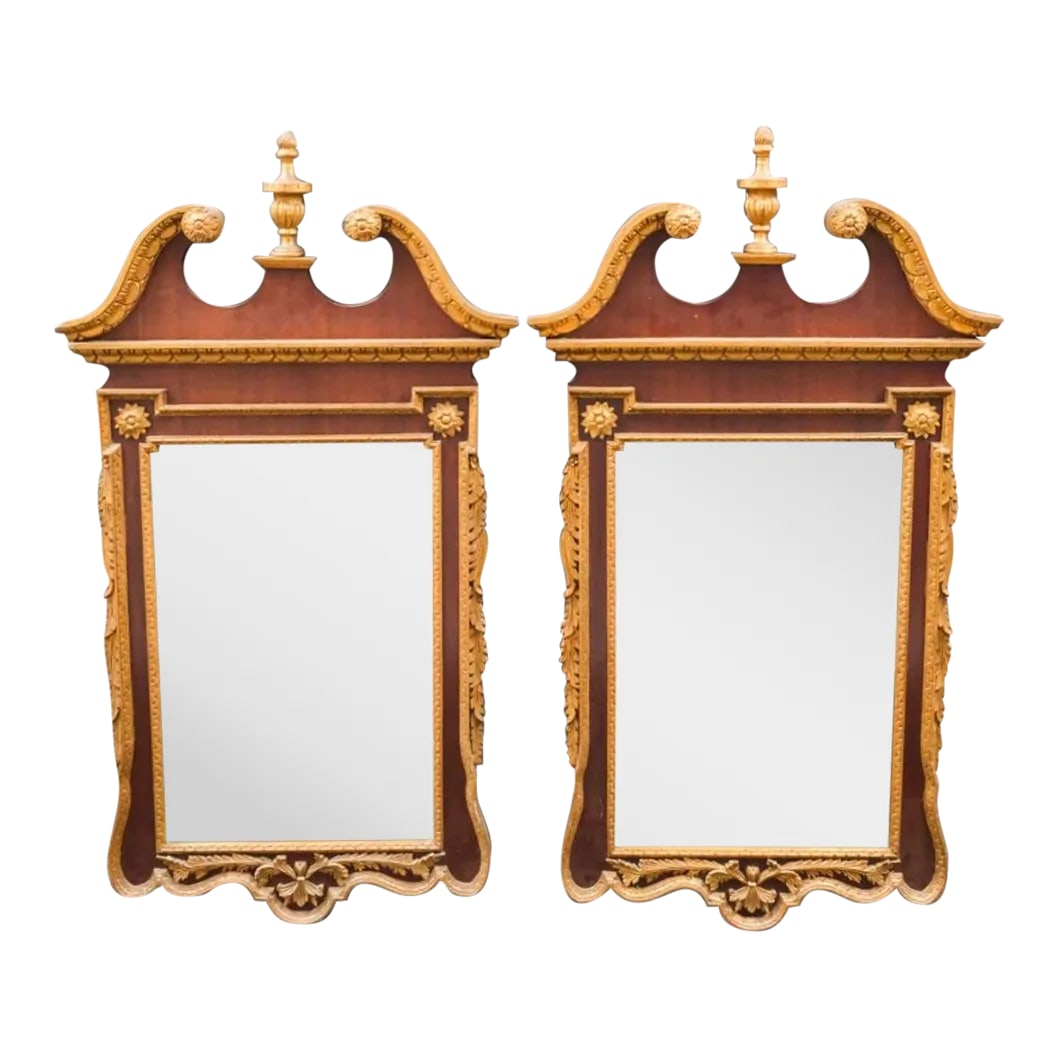 20th Century Chippendale Style Mirrors in Mahogany and Gilt - A Pair: 20th century pair of chippendale style mirrors Nicely made overall dimension 31 1/8 x 57H. Sight size 19 wide by 29h Condition: Alterations: Original Condition Unaltered Imperfections: Some