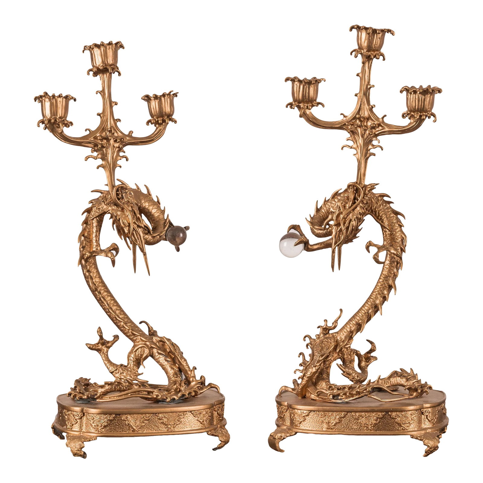 Meiji Dragon Candelabras - a Pair: A pair of Japanese Meiji period bronze dragon form candelabras. Each dragon holding crystal ball. 7 inches wide by 5 inches deep by 15 1/2 inches tall Condition: Alterations: Original Condition Unalte