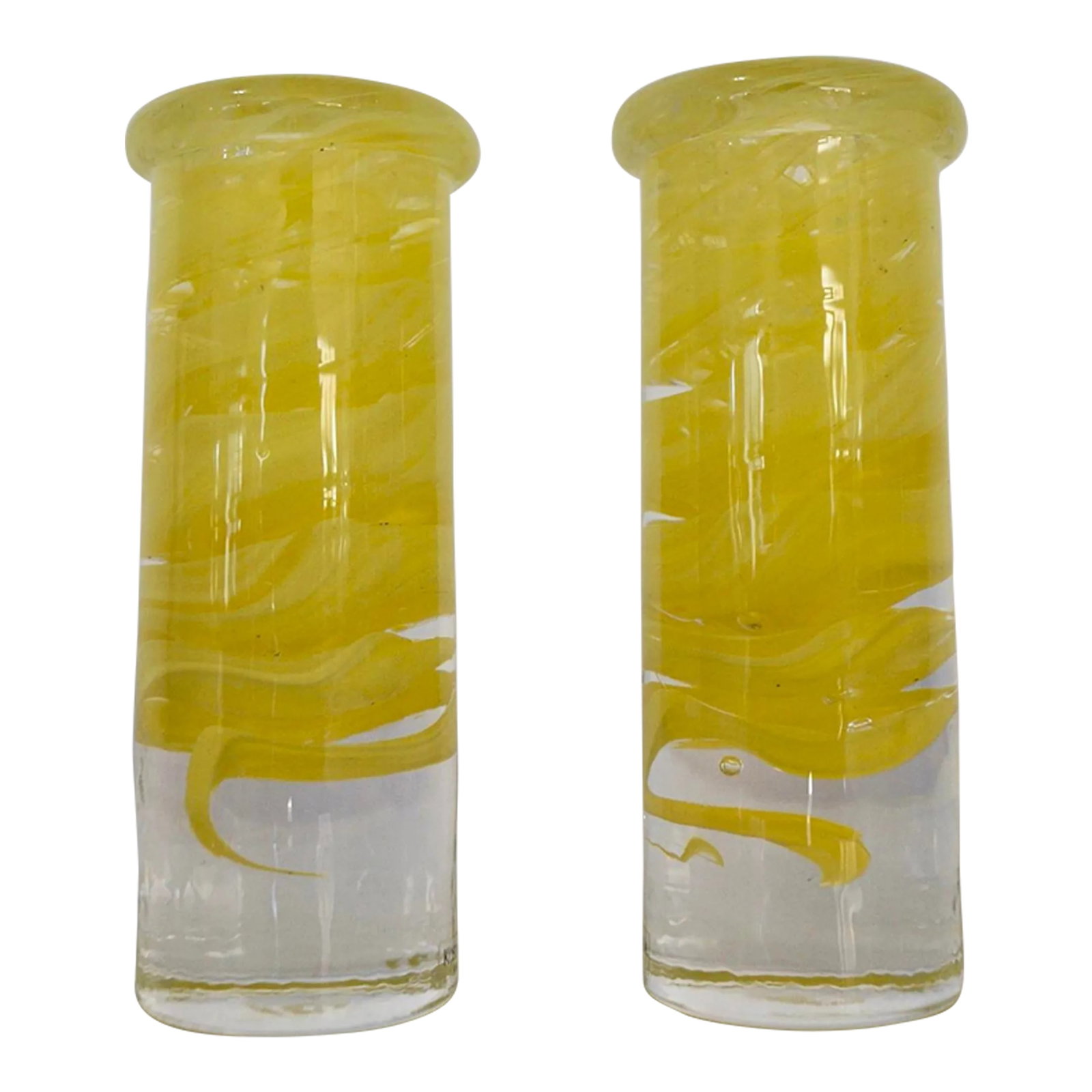 1970's Mid-Century Modern Pop Art Glass Candle Holders - a Pair: Pair of beautiful art glass Swedish Modern candlesticks for sale. From the 1970's, and manufactured by Kosta Boda. Made of thick and solid glass, and has beautiful yellow Atoll swirls. Very retro Pop