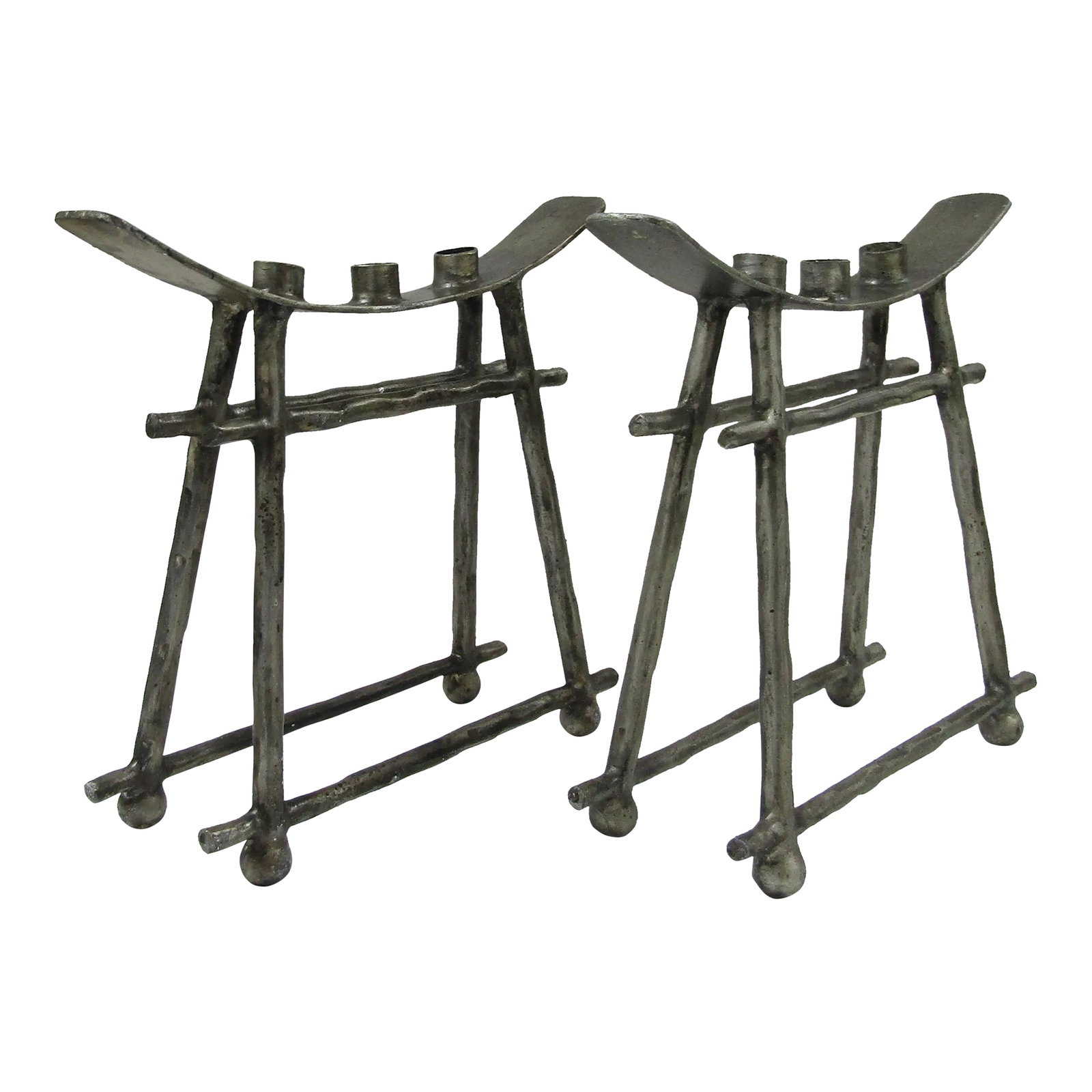 Matched Pair of Vintage Iron Camel Saddle Three Candle Holder Stands: Matched Pair of Vintage Iron Camel Saddle Three Candle Holder Stands Each measures 15" long, 4 1/2" wide and 13" tall. Holds up to a 1" diameter candle. Each weighs 4 pounds, 6 ounces. Condition: