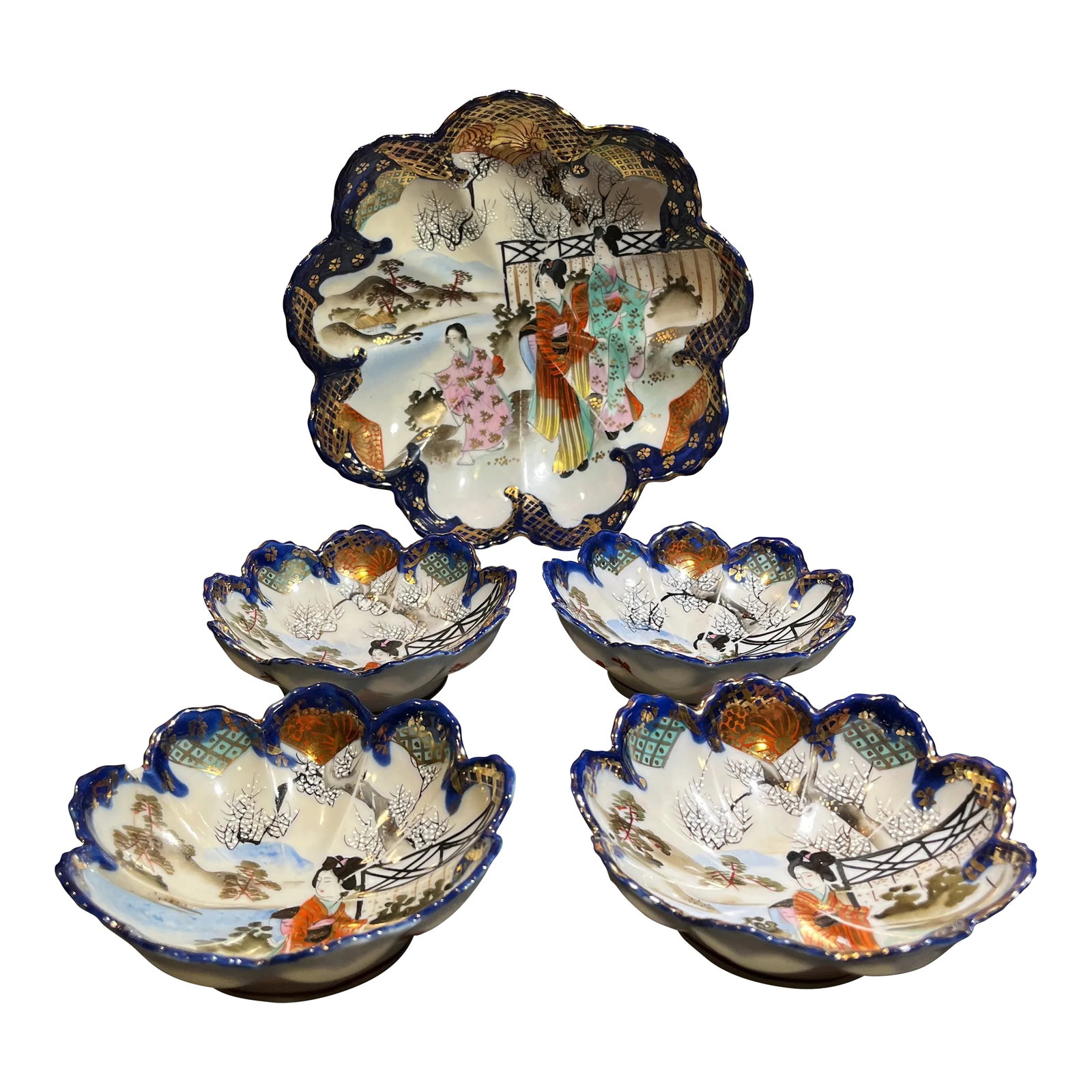 Early 20th Century Navy Blue & Gold Japanese Kutani Bowls- 5 Pieces: Beautiful set of Kutani bowls with intricate hand painted detail. The dark blue color with the gold and white look really sharp. Larger bowl- 9.75" x 9.75" Smaller bowls- 5.5" x 5.5" Condition: