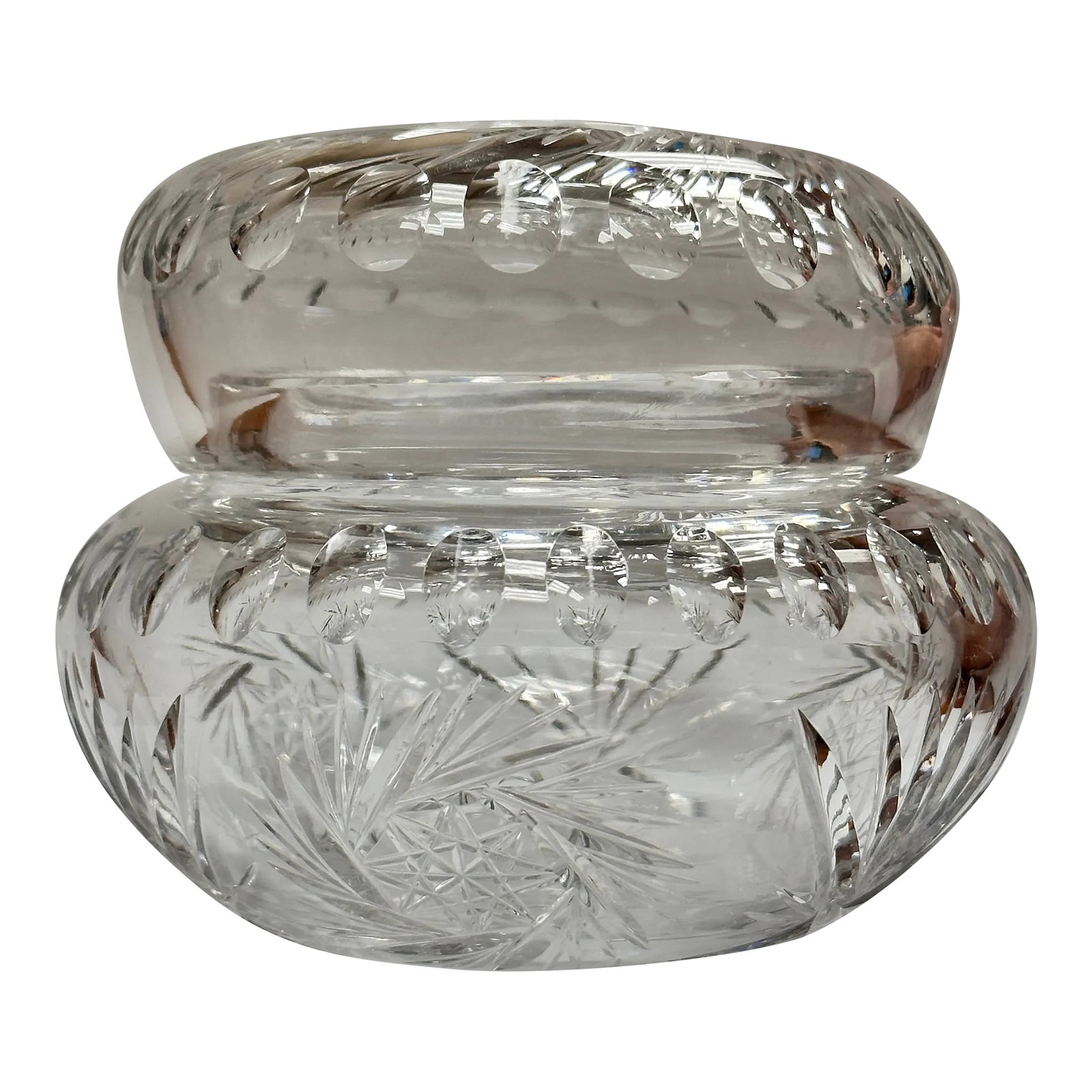 Early 20th Century American Brilliant Cut Crystal Glass Hair Receiver: Antique crystal cut glass hair receiver with pinwheels alternating with fans pattern on base. Cover designed with large pinwheel. An artistic band of oval punties circles both the base and cover. Cond