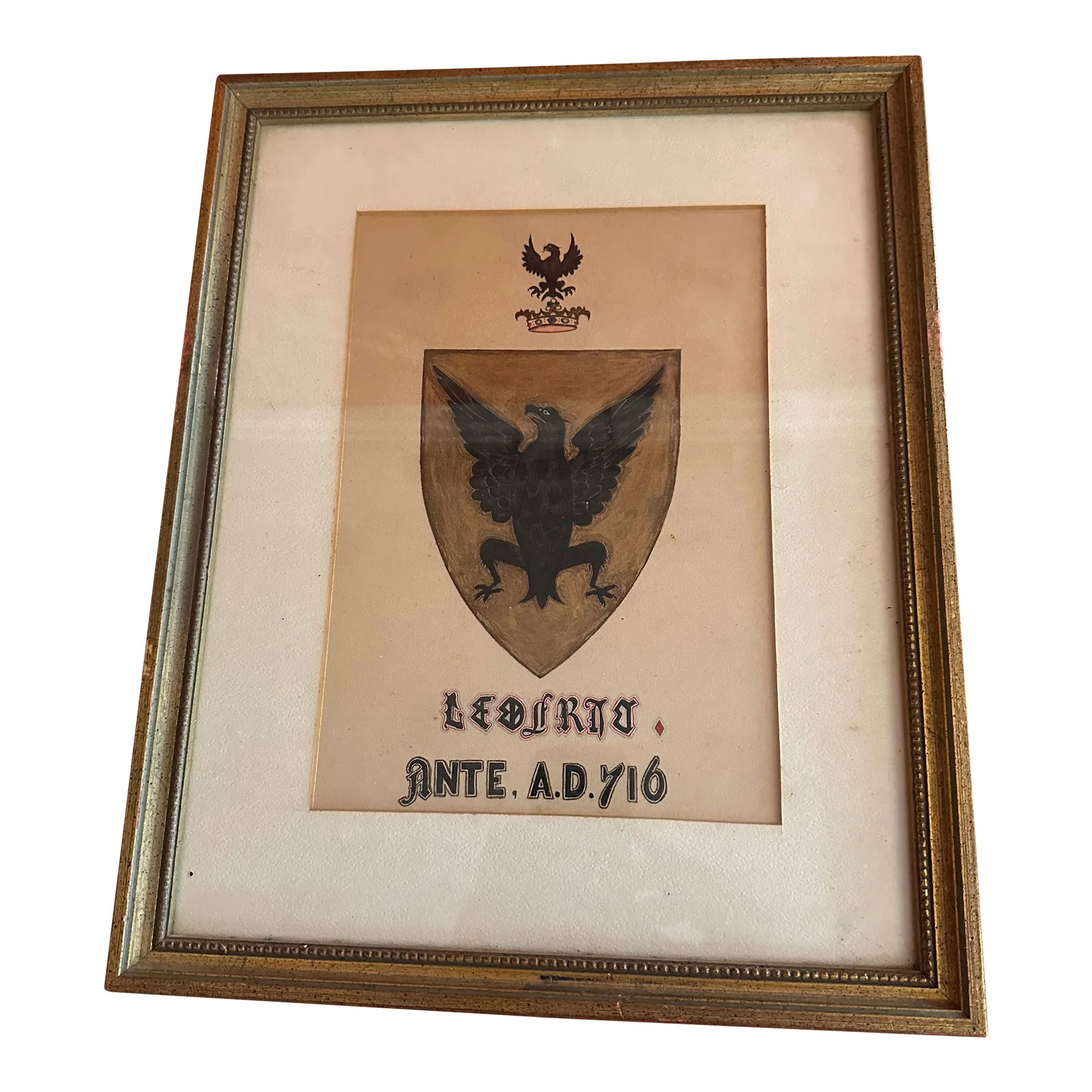 Framed Aristocratic Family Crest Leofric Mercia With Black Eagle and Gold Shield: Aristocratic frames family crest with an old Letter on the back. Saying. LEOFRIC. Or, an eagle displayed table. Crest. A regal crown or surmounted by an eagle displayed It was the crown of the kingdom