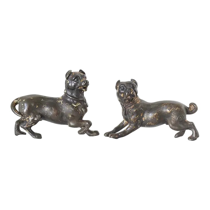 Antique Bronze Pug Dogs, a Pair: Delve into the charm of the 19th century with this exquisite pair of antique bronze pug dogs. Each piece showcases intricate craftsmanship, capturing the playful spirit and detailed features of these