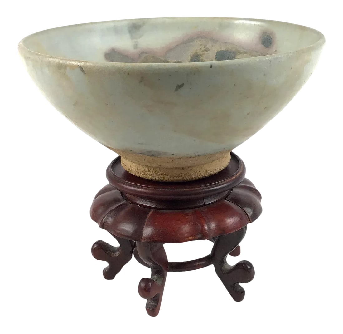 Chinese Junyao Style Oxidized Copper Pottery Bowl on Carved Rosewood Stand: Early 20th Century bowl of Chinese artisan work fired with the oxidation process using copper to create the beautiful hues of color splashes inside. The style is called " Bubble" Bowl because of it's 