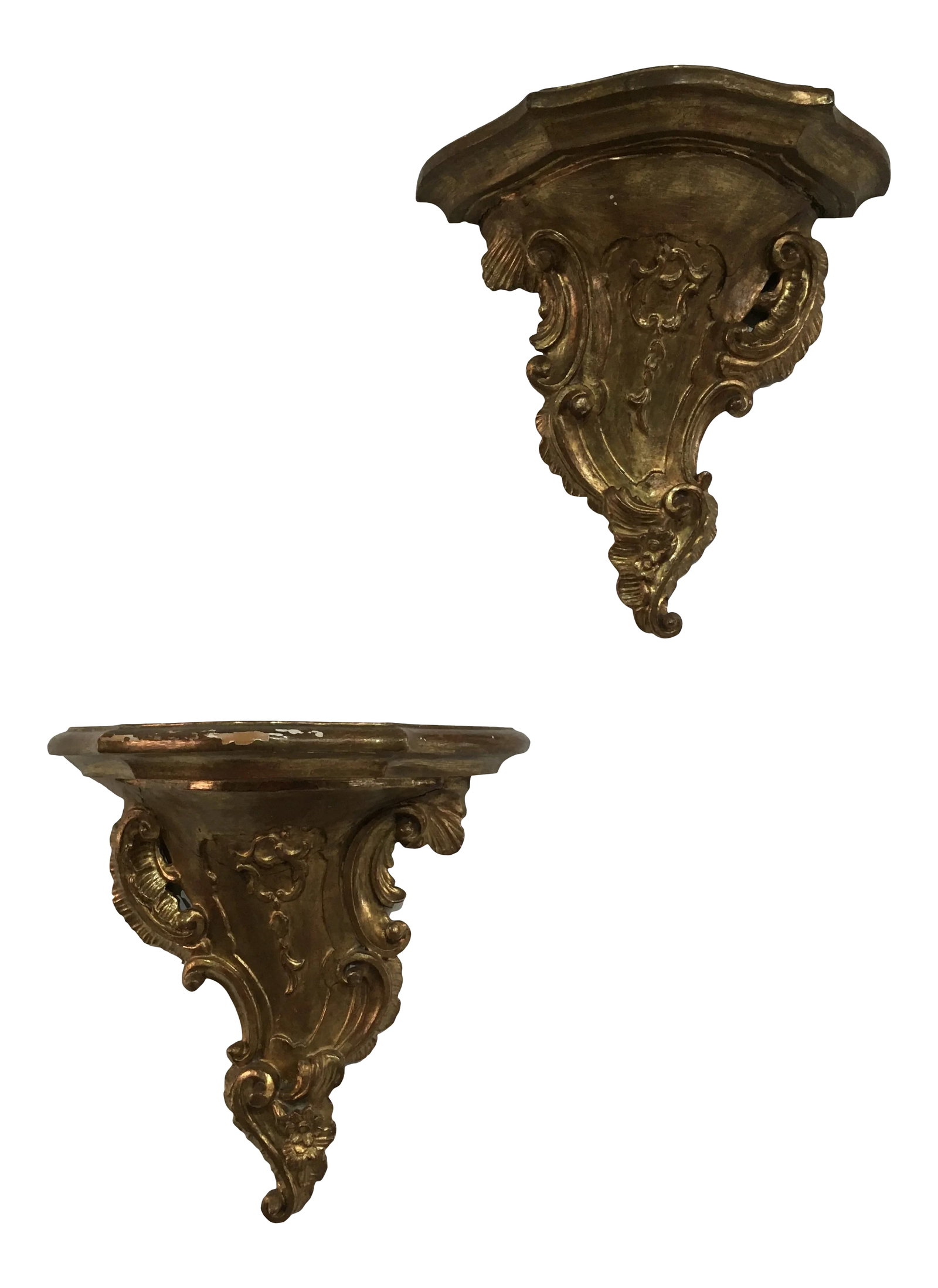 Pair of 19th Century Italian Rococo Giltwood Wall Shelves With Original Gold Leaf: An exceptional pair of authentic 19th-century Italian Rococo wall shelves, masterfully hand-carved from solid wood and retaining their original water-gilded gold leaf finish. Richly sculpted and