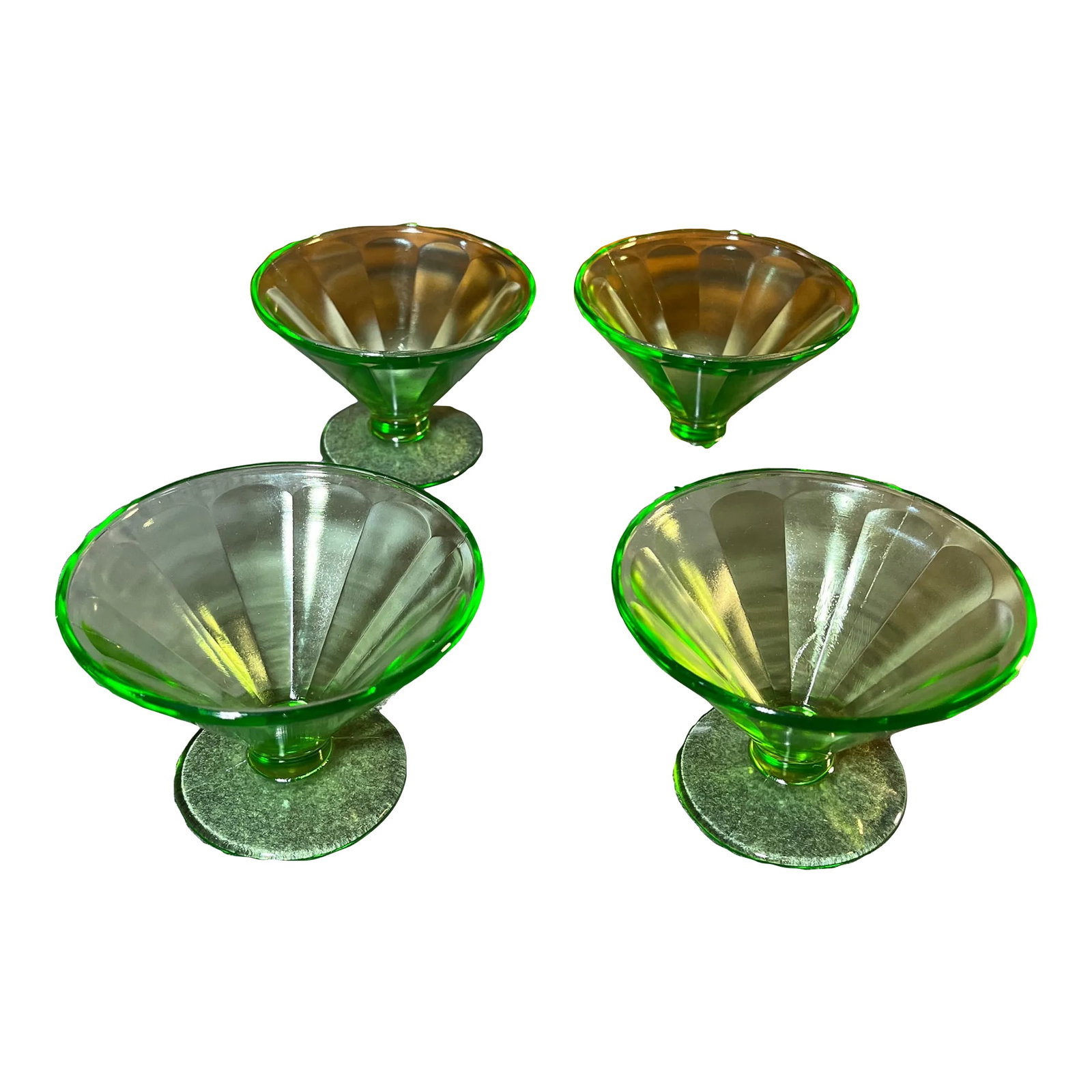 Early 20th Century Uranium Sherbet/Dessert Cups- Set of 4: Brilliant green pedestal cups with a rib optic pattern. Perfect as an ice cream/sherbet/candy cup or even an adult cocktail such as a gin fizz mmmm. Condition: Alterations: Original Condition