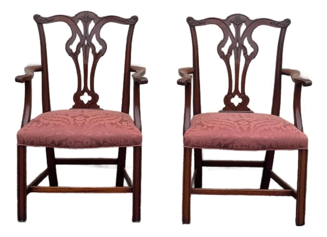 Mid 20th Century Chippendale-Style Mahogany Armchairs With Upholstered Seats - Set of 2: Pair of Chippendale-style mahogany armchairs. Crafted with finely carved splat backs featuring classic Chippendale motifs. Dimensions: 39 1/4" h x 25 7/8" w x 21" d. Seat height 19". They are in great
