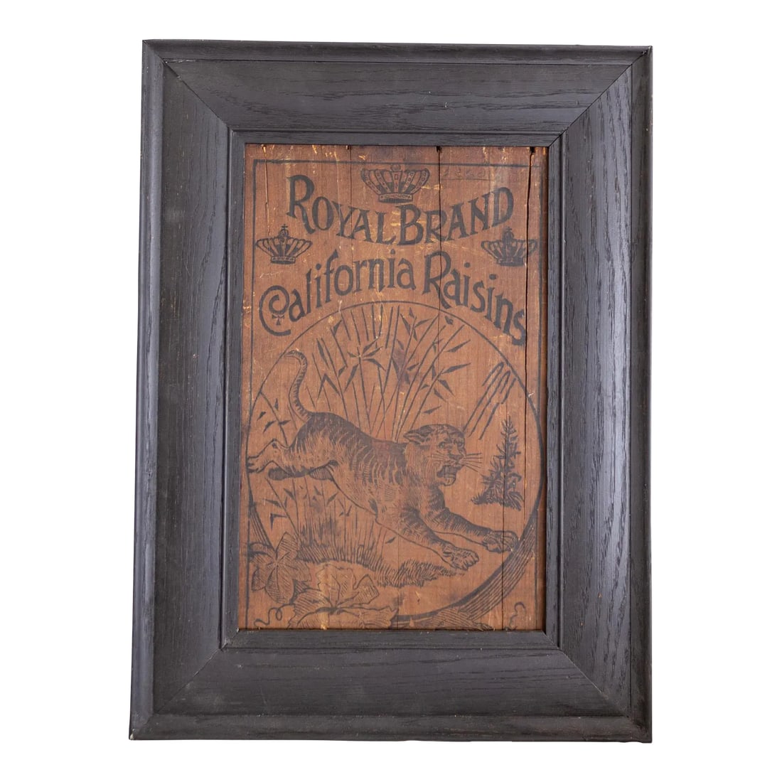 Royal Brand California Raisins With Tiger Wood Crate Panel | 19th C Americana: A late 19th-century wood crate panel advertising 'Royal Brand California Raisins' features three crowns around the font, a leaping tiger with bamboo stalks in the background, and grape leaves in the