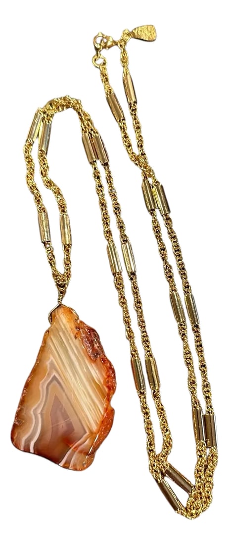 Late 20th Century Signed Yochi New York Natural Agate Slab Gold Tone Necklace: Natural Agate Slice Pendant on long chain. Pendant measures 2.5" long x 1.625" wide x 25" wide Including the chain measures 23" long Marked YOCHI NY Circa 1990's Condition notes: Excellent. The slab