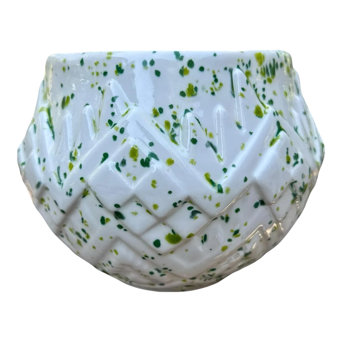 1970s Green Splatter-Ware Geometric White Planter Vase: Vintage biconic-shaped white vase or planter with a lime and dark green speckles applied in splatter technique. Geometric design in bas relief add design texture and visual appeal. Add a bright funky