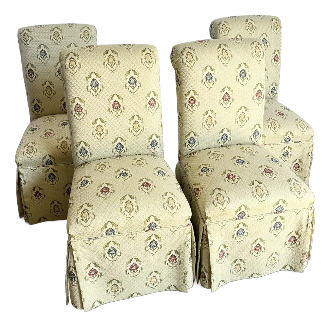 Vintage Regency Skirted Dining Chairs - Set of 4: Elegance meets comfort in this set of four vintage Regency-style skirted dining chairs. Upholstered in a soft cream fabric with a delicate floral medallion pattern, these chairs exude timeless