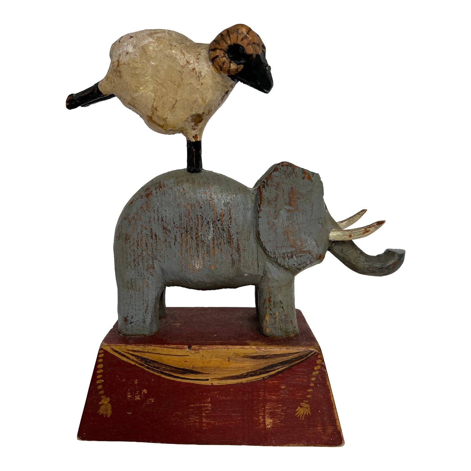 Original Signed Tom Kelly Folk Art Elephant Ram Wood Sculpture: Signed, original Tom Kelly, folk artist sculture with elepahnat and ram standing on pedestal. Everything is hand painted and make you smile to see the ram standing on his forelegs. Unique piece of