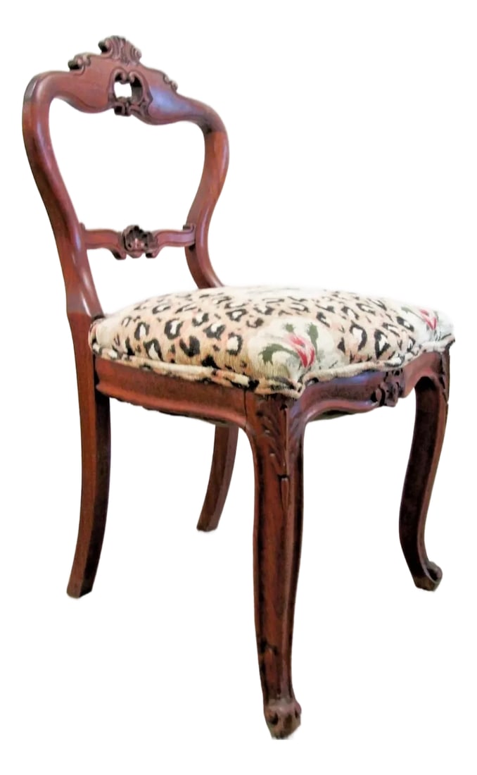 Antique Victorian Carved Walnut Balloon Back Occasional Side Chair: This antique Victorian carved walnut balloon back occasional side chair is a stunning piece of furniture from the late 19th century. Handmade in the United States, this chair features intricate