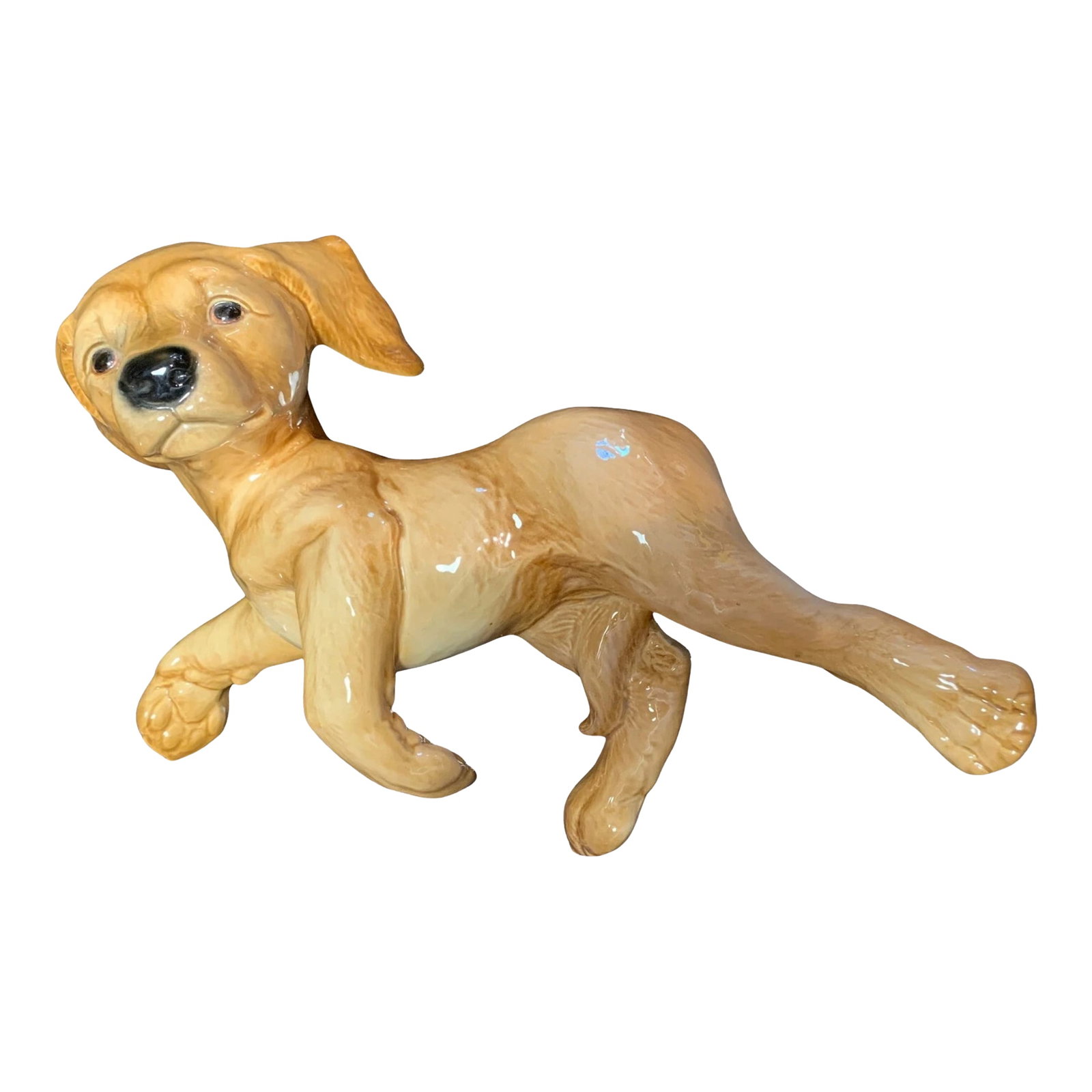 Large Goebel Porcelain Labrador Retriever Puppy: This mid-century Goebel porcelain labrador retriever puppy, crafted during the West Germany era, captures a moment of pure, unfiltered playfulness. Measuring 14 inches wide, the figure is rendered in