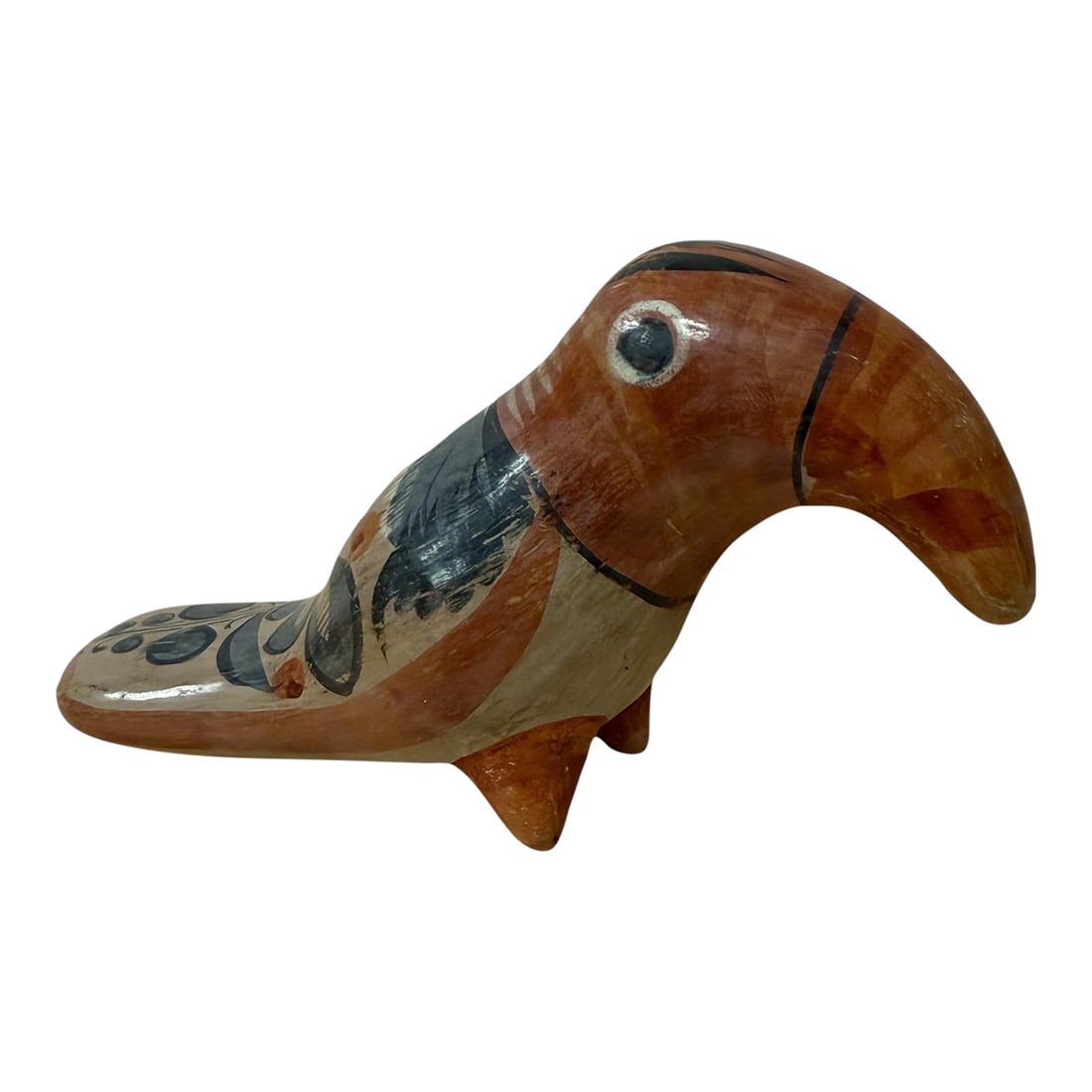 Mid 20th Century Tonala Toucan Clay Bird Pottery Folk Art: Traditional earth tone colors for this adorable Toucan. Tonala Clay Pottery Mexican Folk Art 7.75" long x 4.25" tall x 2.5" wide Condition: Alterations: Original Condition Unaltered Imperfections: