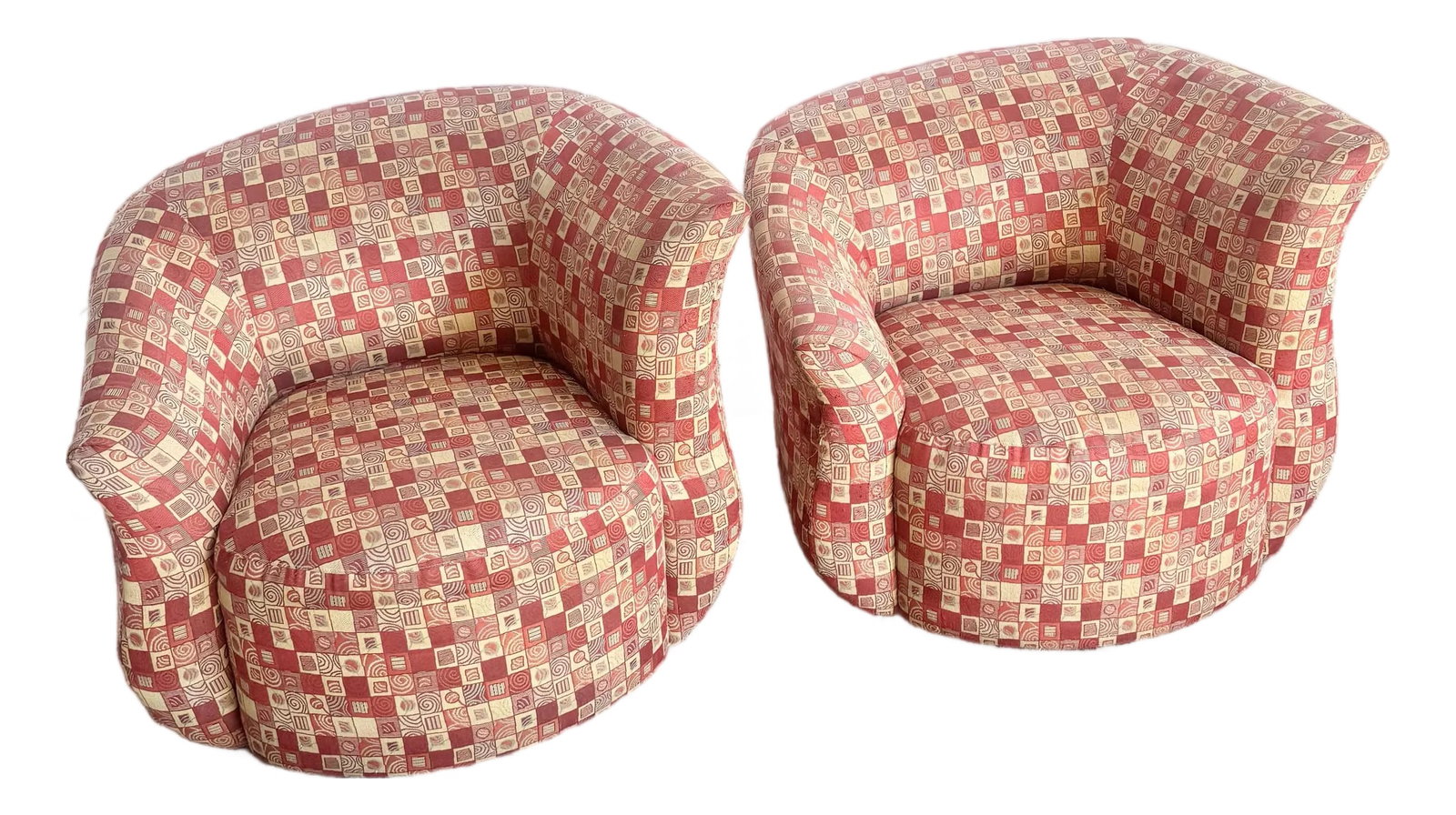 Postmodern Red and Gold Fabric Sculpted Swivel Arm Chairs - A Pair: This striking pair of postmodern swivel armchairs features sculptural curved silhouettes wrapped in vibrant red and gold geometric upholstery. The bold pattern captures the playful spirit of late 20th