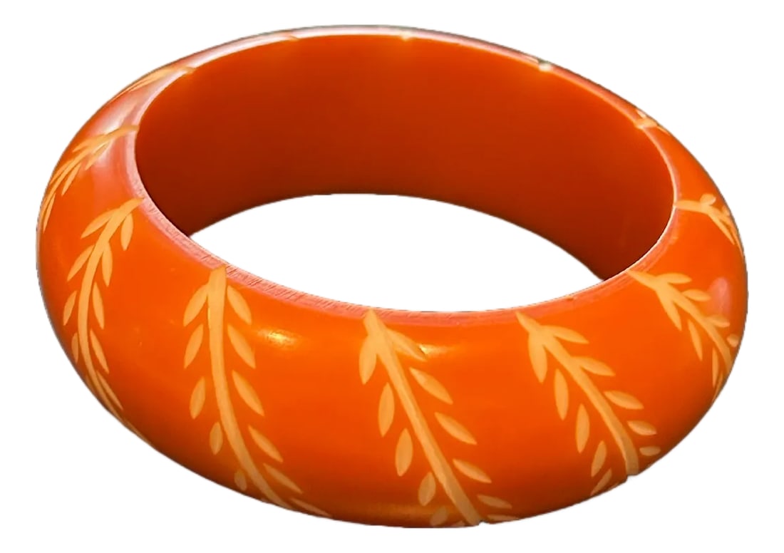 Vintage Bakelite Bangle Bracelet in Chunky Orange With Carved White Floral and Leaf Design, Domed (1 of 5)