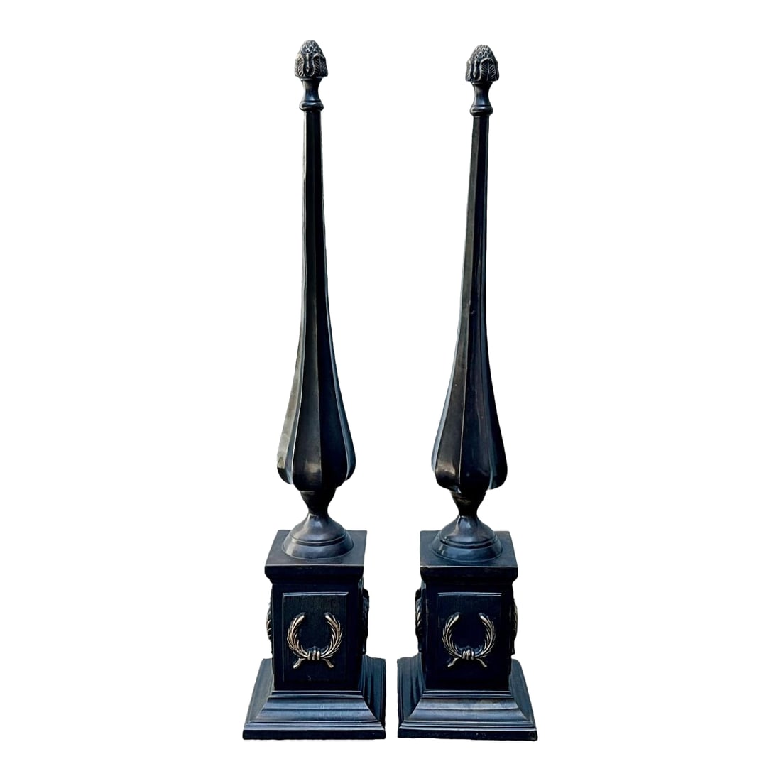 Pair of Mid 20th Century French Patinated Bronze Laurel Wreath Spire Obelisks: Pair of French Patinated Bronze Laurel Wreath Spire Obelisks Tall French bronze spire obelisks standing at 28" high. These feature laurel leaf wreaths on the base and an acorn motif at the top of the