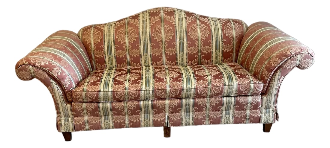 Southwood Chippendale Camelback Sofa: Beautiful large Chippendale camelback sofa with large curved arms and five mahogany legs. High quality cotton fabric. Rose field bordered by tan and light green stripes. Includes two matching fabric p