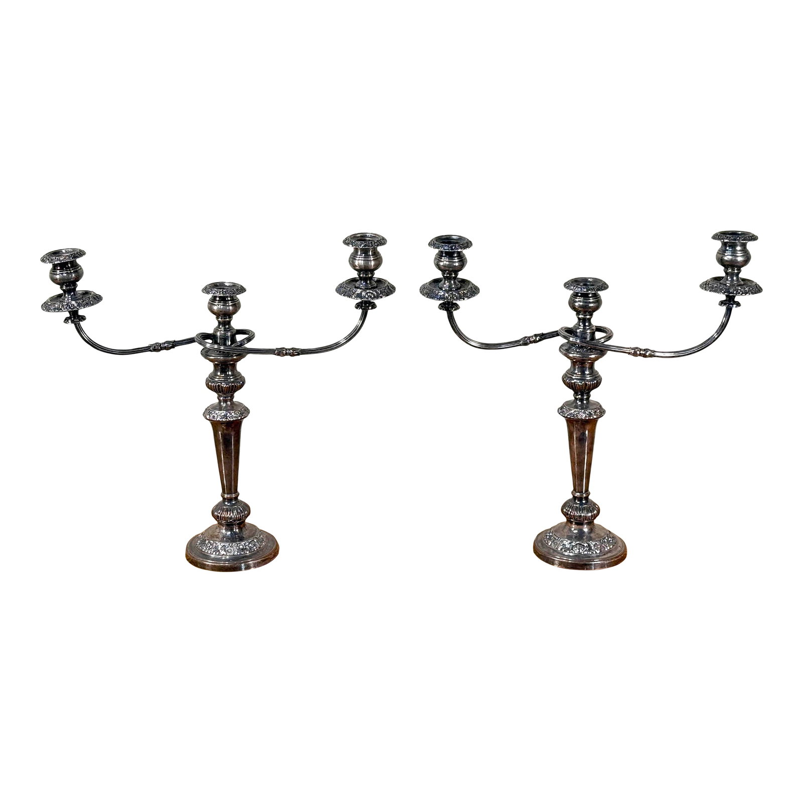 Antique Edwardian Silver Plated 3-Arm Candelabras - A Pair: A handsome pair of antique three-arm candelabra in a late-Victorian / Edwardian style. Each features an ornate baluster standard with removable two-arm branches that convert the pieces to single