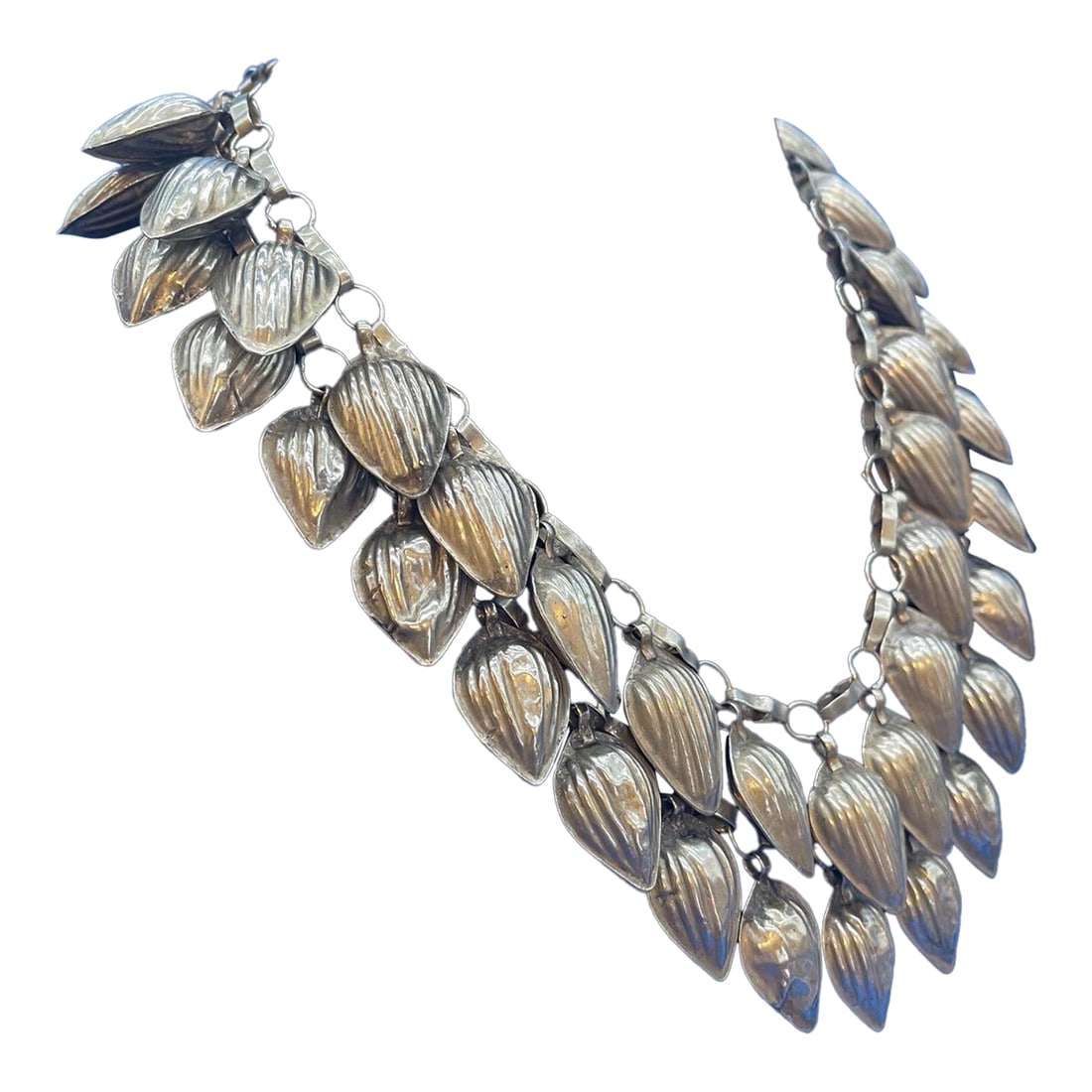 Antique Turkmen Yemeni Silver Leaf Double Chain Necklace: Beautiful statement piece, rare find. Middle Eastern statement necklace. This antique Turkish Yemeni necklace features hollow leaf charms on a double strand chain. Stunning piece of historic ethnic
