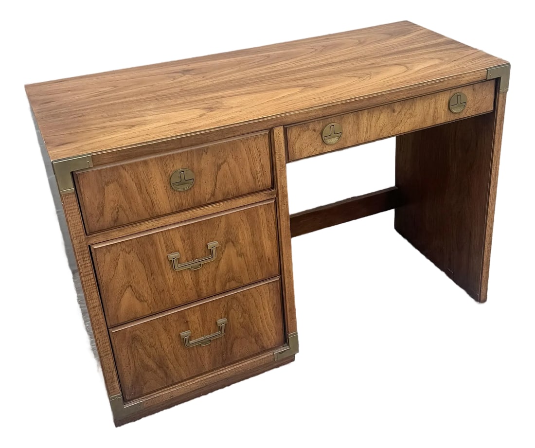 Vintage Huntley Campaign Desk by Thomasville: A refined vintage Huntley campaign desk by Thomasville, showcasing the enduring appeal of classic campaign-style design. Crafted in richly grained wood with warm tonal variation, the piece is accented