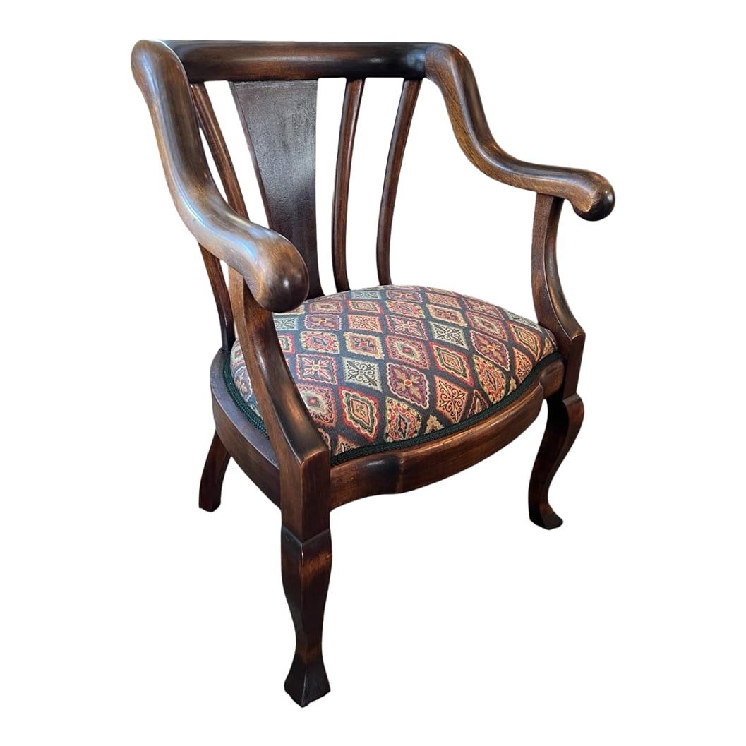 Early 20th Century Empire Scroll Chair in the Fashion of Muelller: A refined Empire-style scroll armchair crafted in richly patinated mahogany, executed in the fashion of Mueller. The chair features bold rolled arms, an architectural open back, and elegantly shaped