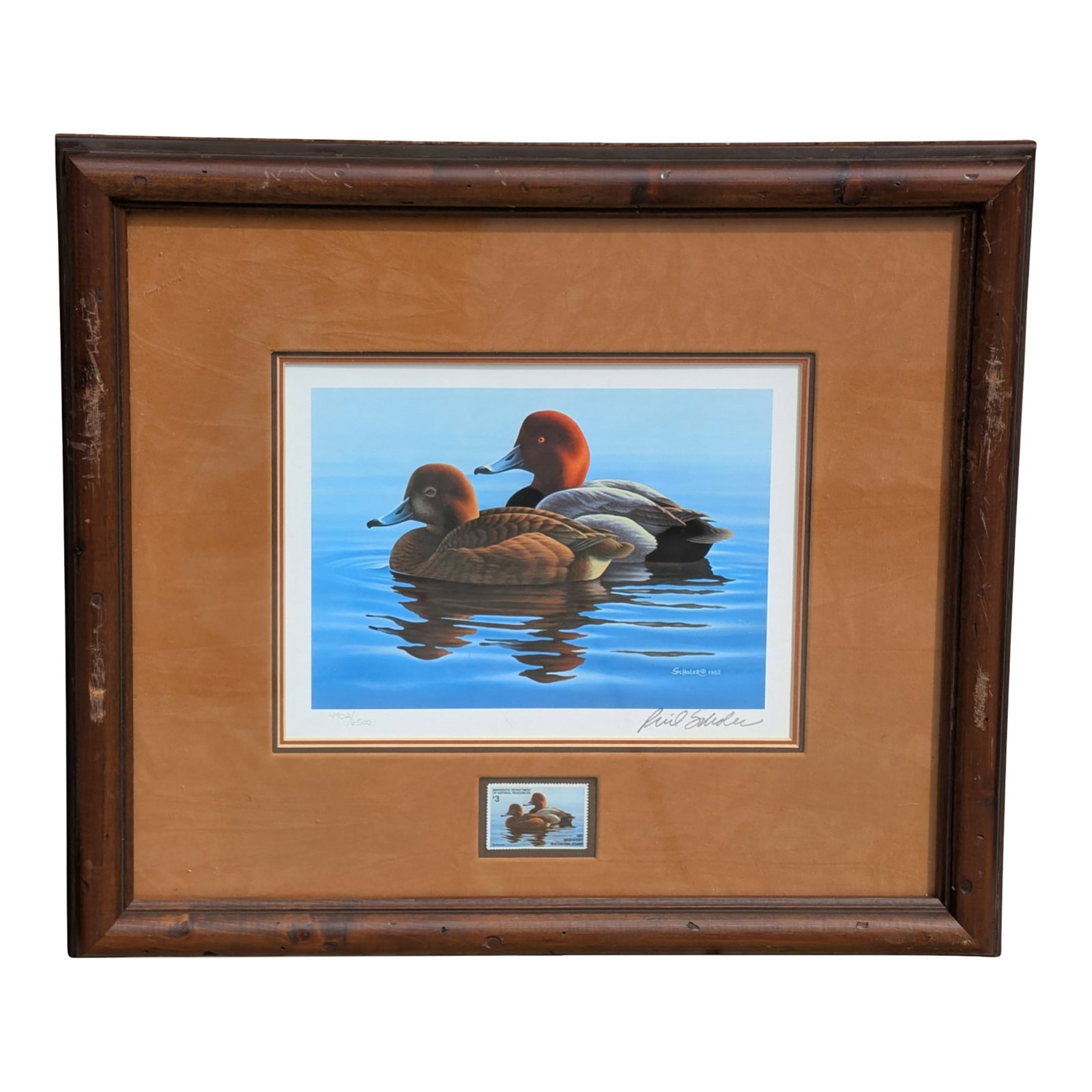 1980s Minnesota Duck Stamp Print and Original Stamp by Artist Phil Scholer: 1982 Minnesota Duck Stamp Print and original Stamp by artist Phil Scholer. Subject: Redhead ducks on water. The framed set features a limited edition print and a signed duck stamp. Signed and numbered