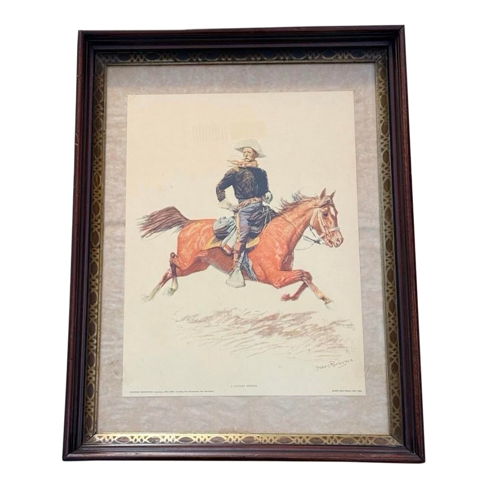 1956 "A Cavalry Officer" Frederic Remington Print in Vintage Wood Frame (Penn Prints, Ny): A classic slice of Americana-with that unmistakable Frederic Remington energy: wind in your face, a galloping horse, and a cavalry officer who looks like he's headed somewhere important. This is "A