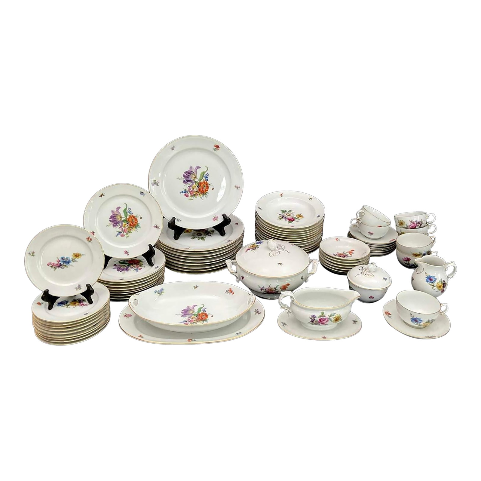 1980s Exceptional Set of Furstenberg "Ancestral Dresden" China - 71 Pieces: Exceptional set of Furstenberg "Ancestral Dresden" China - 71 pieces White china with center vibrant floral bouquet and floral motif to rim with gold trim. Made in Germany. Vintage, discontinued patte