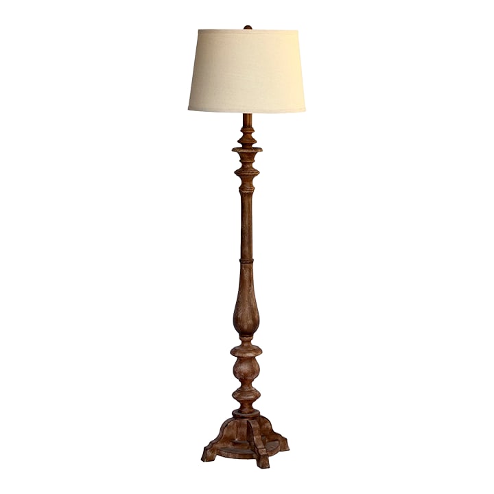 Vintage Spindled Floor Lamp: A Charming Vintage Farmhouse style Spindled Floor Lamp with shade. Double Light bulb socket. Looks like wood, however is made of resin. Shade 16"Circ 11"H Condition: Imperfections: Some Imperfections