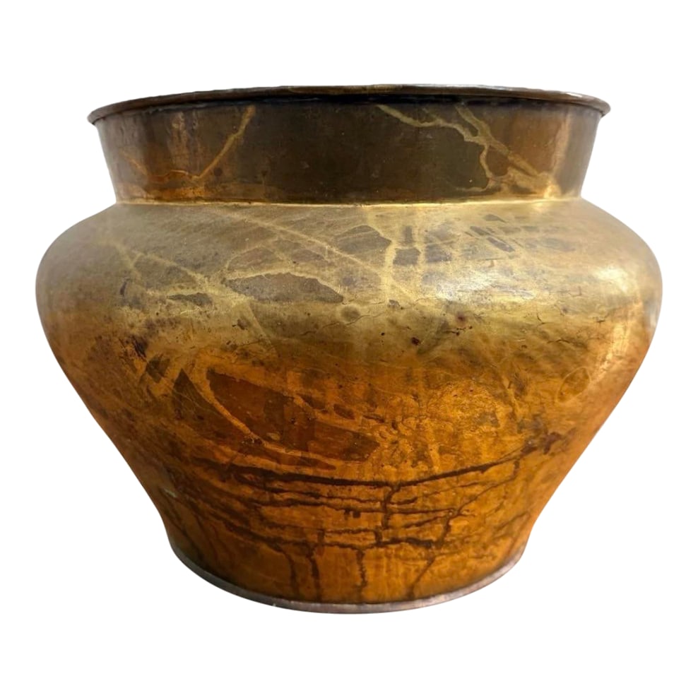 Antique Hand-Hammered Brass Vessel / Planter With Aged Patina: A sculptural antique brass vessel with the kind of timeworn surface that simply cannot be replicated. This substantial piece has a beautifully rounded, shouldered form with a wide flared mouth and