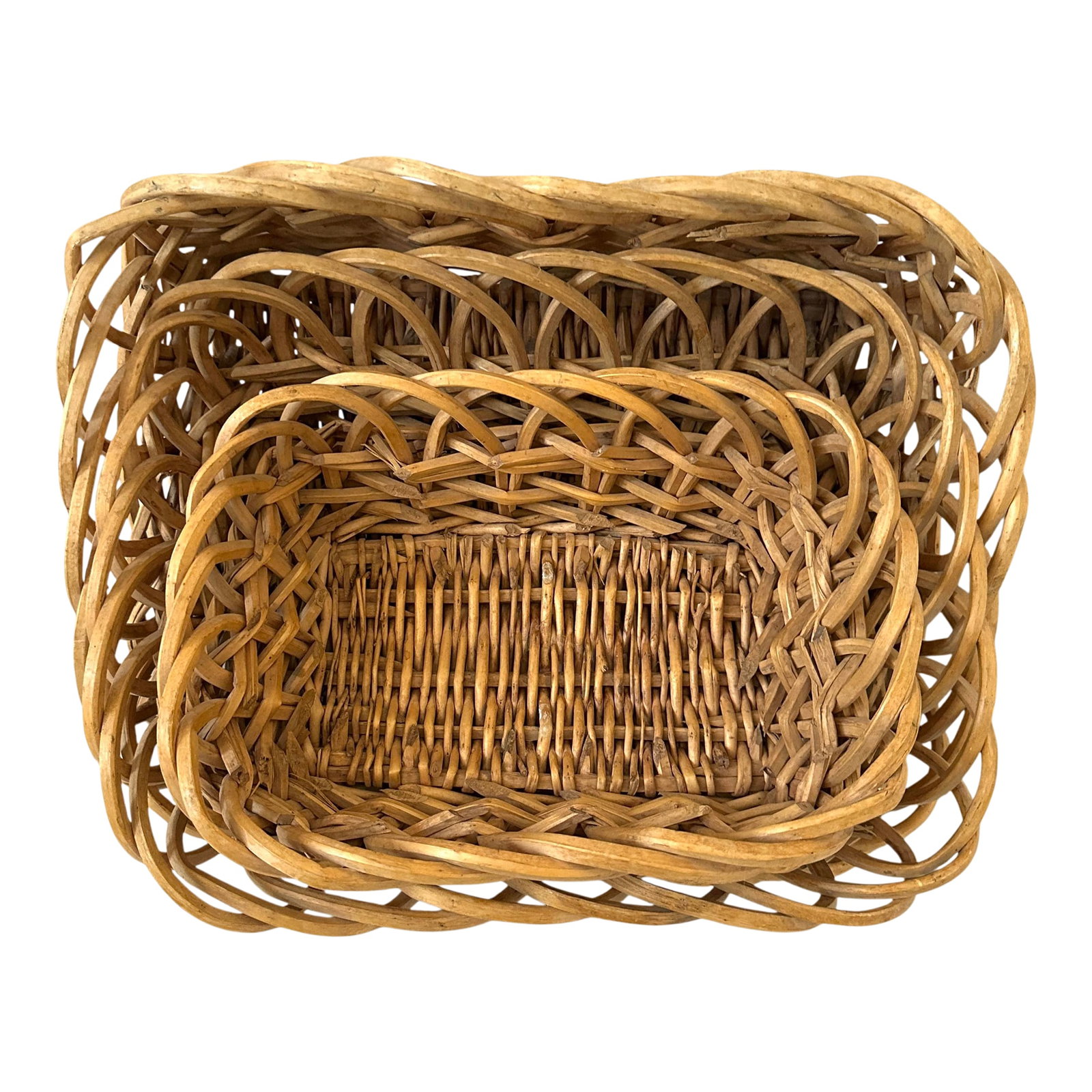 Vintage French Nesting Baskets: Vintage French Nesting Baskets in a thick sturdy wicker. Perfect for bread, fruit or napkins etc. Lg-18.5in w x 14.5in d x7in h Med-16.5in w x 12.75in d x 6in h Sm-13.5in w x 9.75in d x 5in h Make