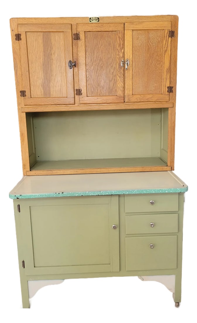 Antique Sellers "Kitcheneed" Hoosier Cabinet - Elwood, Indiana - Sage Green & Oak: Bring a piece of early 20th-century history into your home with this authentic Sellers Kitcheneed Cabinet. Manufactured by G.I. Sellers & Sons in Elwood, Indiana, this "Better Kitchen Cabinet" was the