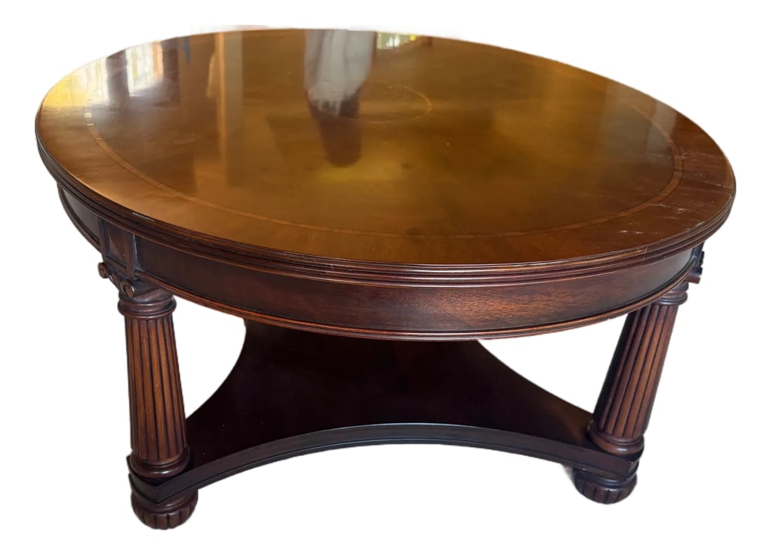 Late 20th Century Henkel Harris Model 5249 Oval Mahogany Coffee Table [Cb]: A beautifully executed Neoclassical-inspired coffee table by Henkel Harris, featuring a richly figured mahogany top with striking radial marquetry and inlaid banding. The circular composition draws