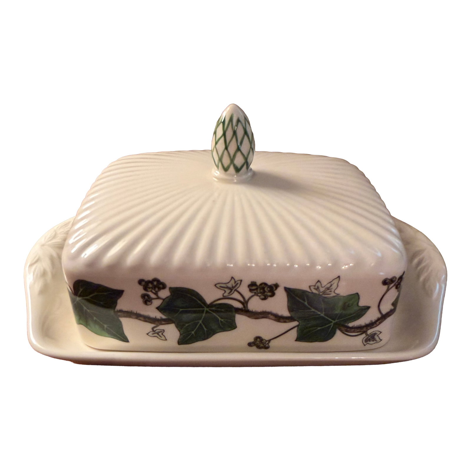 Vintage Wedgwood Edme Queen's Ware With Ivy Covered Butter Dish: The Vintage Wedgwood Edme Queen's Ware Ivy Covered Butter Dish is a collectible piece originating from England in 1945. Made of bone china, this elegant butter dish features a white EDME pattern with 