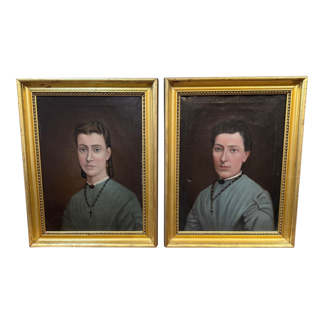 Pair of European Portrait Paintings, Mother & Daughter, Late 19th Century: A charming pair of late 19th-century European oil portraits, likely depicting a mother and daughter. Unsigned and painted on stretched canvas, these works are housed in matching gold-tone frames with 