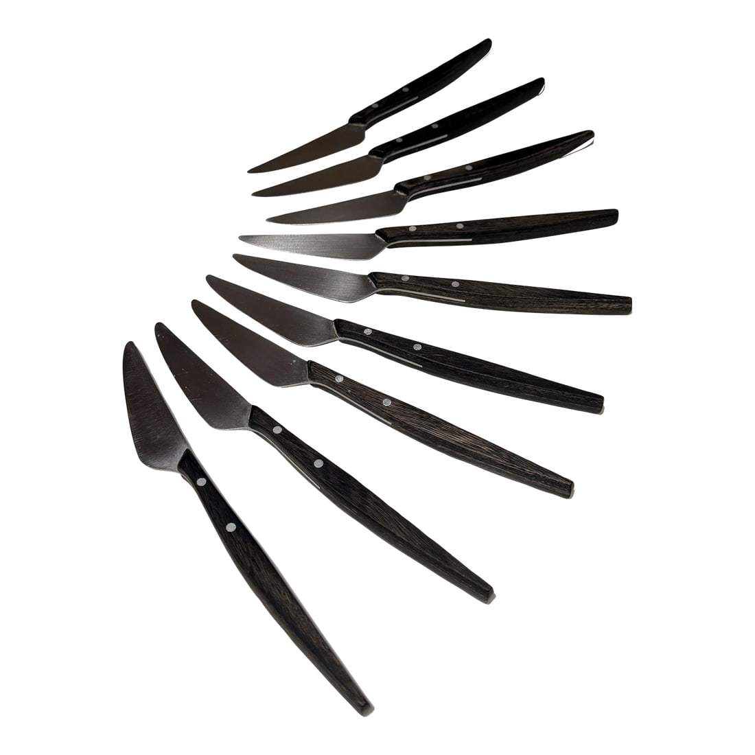 1960s Mid-Century Modern Mac De Luxe Series Steak Knives Japan Stainless Steel Wood - Set of 9: For your consideration, a set of nine (9) vintage Mac De Luxe series steak knives, Made in Japan circa the 1960s. Feature a distinctive sleek, sculptural profile with dark wood handles. Forged stainle