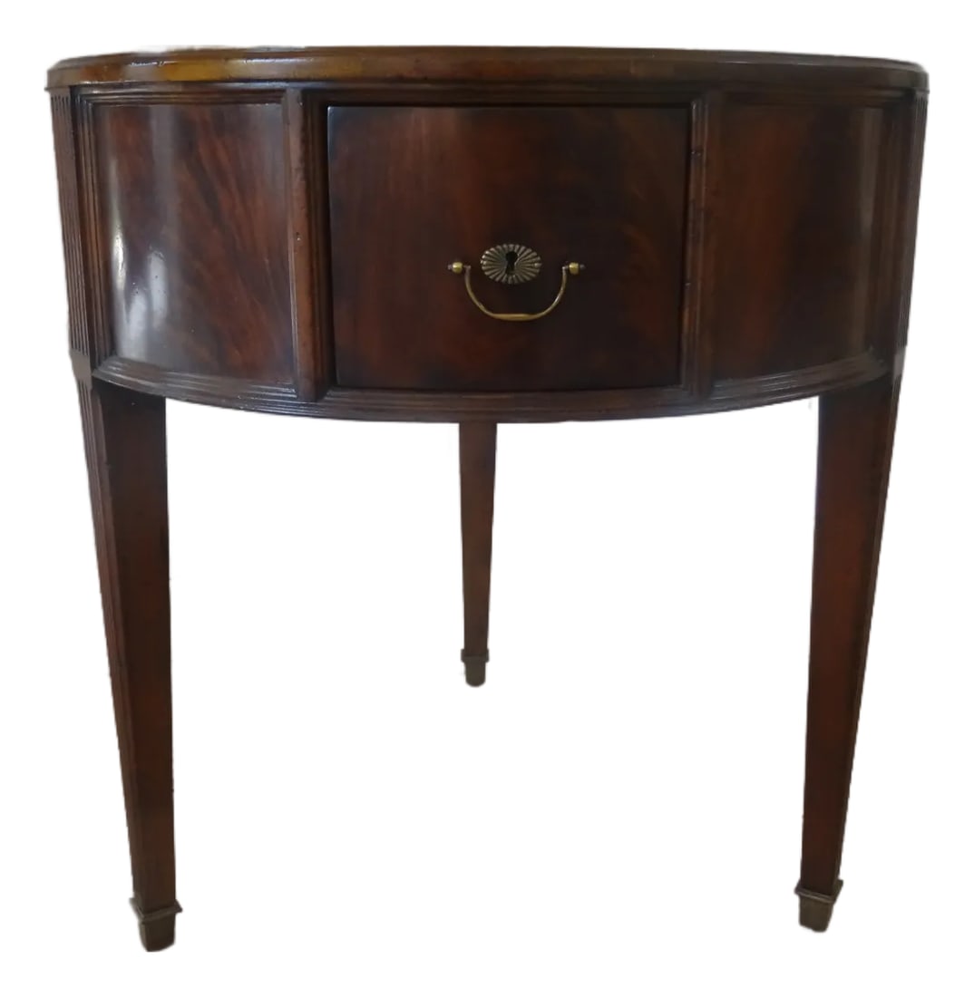 Late 20th Century Henredon Acquisition's Flamed Mahogany Drum Table: The Burnet Round side table is a timeless traditional inspired drum table with a beautiful flamed mahogany top and sports 3 small drawers with brass capped legs. Made with some natural distressing to 