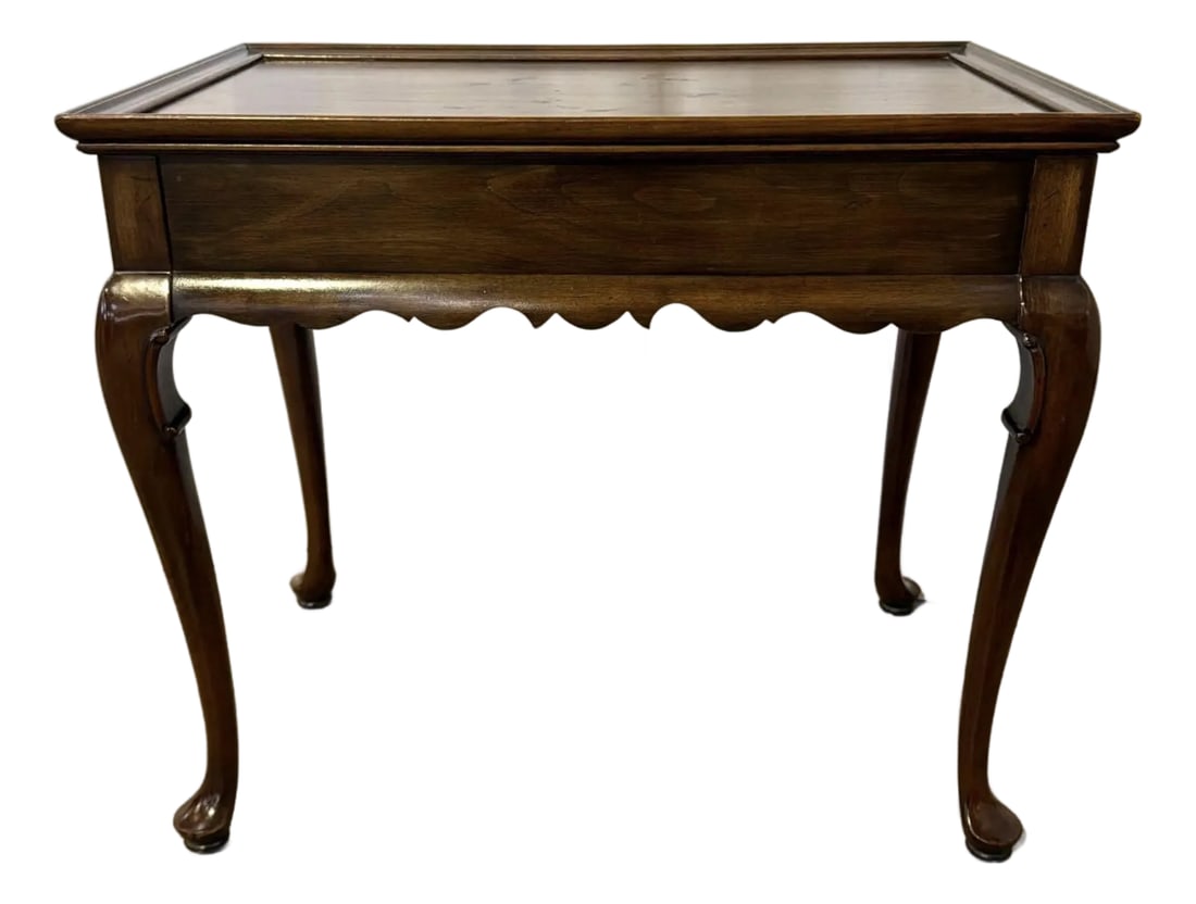 1981 Ethan Allen Georgian Court Queen Anne Cherry Tea Table With Pull Out Trays: Bring timeless elegance to your space with this classic Queen Anne style tea table from the highly collectible Ethan Allen Georgian Court Collection. Manufactured in 1981, this beautiful solid wood ac