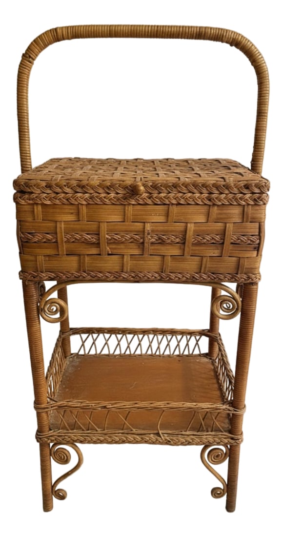 1900s Antique Heywood Brothers & Wakefield Co. Wicker Sewing Basket Stand: This authentic 1900s Heywood Brothers & Wakefield Co. floor-standing wicker sewing basket stand features intricate woven rattan, rich patina, and the original manufacturer's paper label with hand-inke
