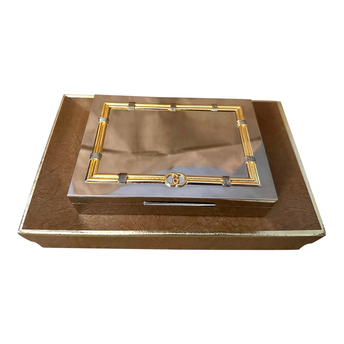Vintage 1960's Gucci Silver/Gold Plate Trinket Box: A highly sought-after vintage Gucci box. Faux bamboo border with GG , The interior retains the original wooden lining and the box is stamped "Gucci Italy". When finding this gem it came in a gucci box