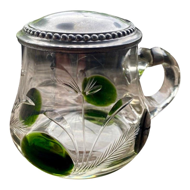 Antique German Jugendstil Glass Beer Stein With Green Applied Glass & Pewter Lid, Circa 1900: An unusually elegant German glass beer stein dating to the turn of the 20th century, circa 1900, combining clear glass, deep emerald-green applied glass decoration, delicate wheel-engraved botanical